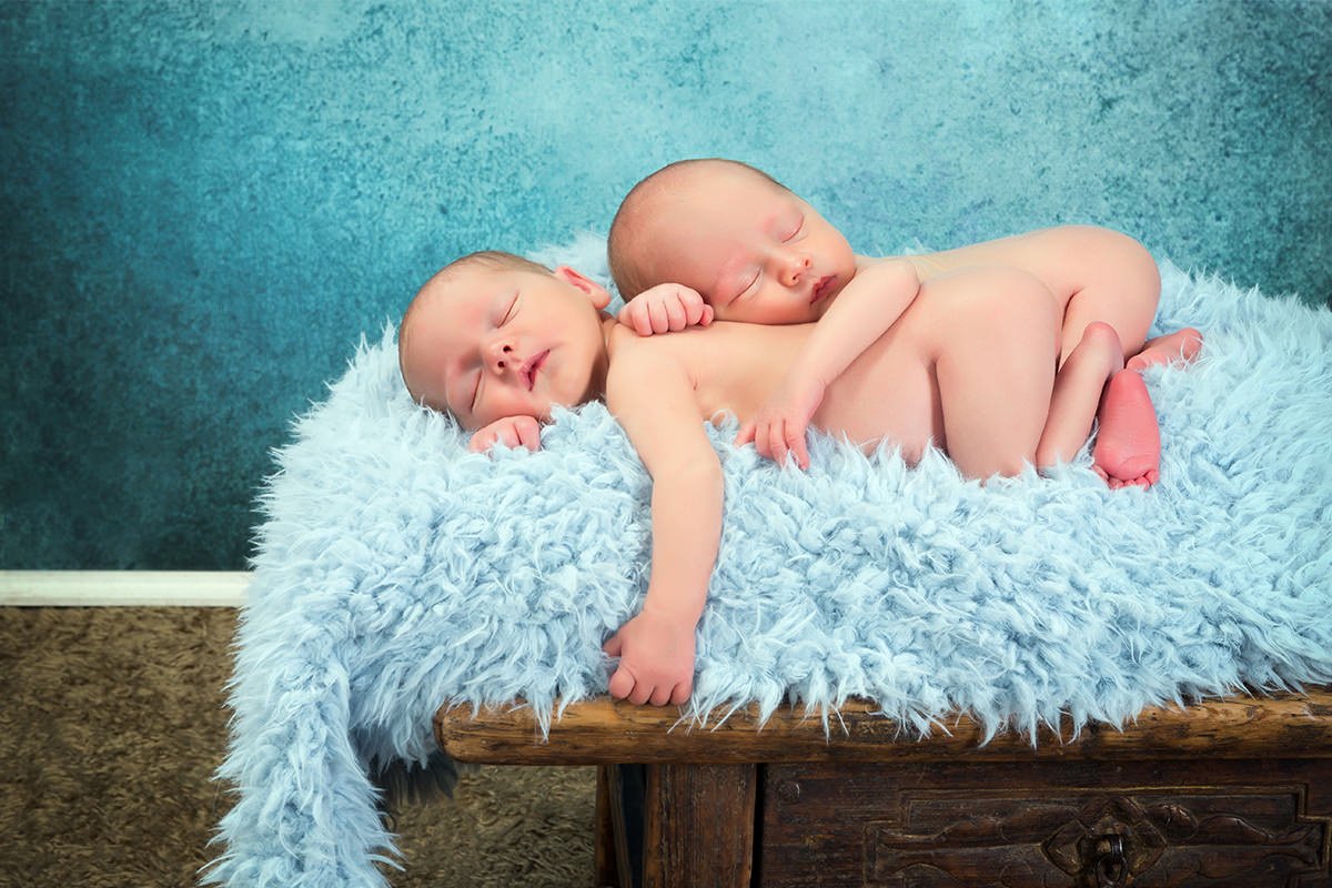 Newborn Babies Laying on Fluffy Blanket 1 Newborn Babies Laying on Fluffy Blanket 1